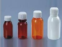 plastic cough syrup bottles