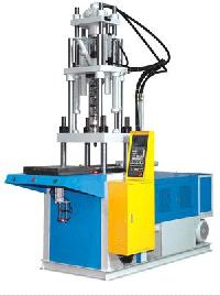 vertical plunger injection moulding machine