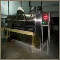 swing tray oven