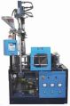 Vertical compact Injection moulding machine