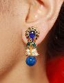 peacock style with pearl drop earrings
