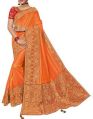 Pure silk Orange color Saree with heavy border saree