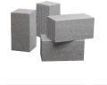 Grey rectangular cement bricks