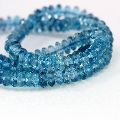 Polished Oval Round Blue Topaz Beads