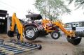Black Yellow tractor mounted backhoe loader