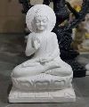Buddha statue in white marble
