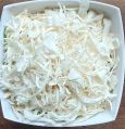 Creamy dehydrated white onion flakes