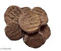 Brown dry cow dung cake